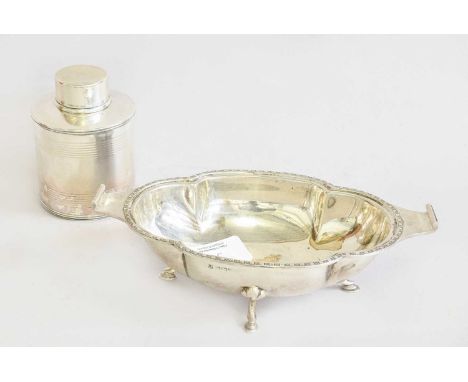 A George V Silver Dish, by Cooper Brothers and Sons Ltd., Sheffield, 1933, shaped oval and on four scroll feet, 18.7cm wide; 