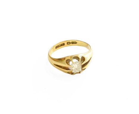 An 18 Carat Gold Diamond Solitaire Ring, the old cut diamond in a yellow claw setting, to a plain polished shank, estimated d