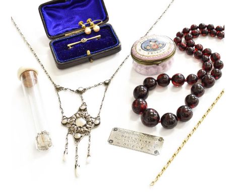 A Fancy Link Bracelet, stamped '750', length 17.5cm; An Arts &amp; Crafts Style Necklace, of quatrefoil design set with mothe