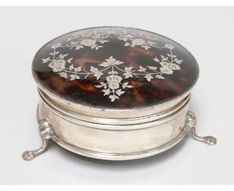 A George V Silver and Tortoiseshell Ring-Box, Maker's Mark Rubbed, Birmingham, 1918, circular and on three scroll-capped feet