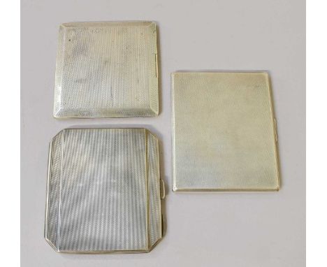Three Silver Cigarette-Cases, each square or oblong and with engine-turned decoration, one engraved inside with initials and 