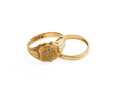 A 9 Carat Gold Signet Ring, finger size R; and A Band Ring, indistinctly marked, finger size M1/2Gross weight 6.0 grams.