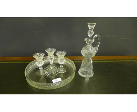 An Edinburgh crystal thistle etched miniature decanter and stopper together with three sherry glasses and a circular tray (5)