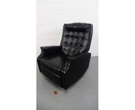 A retro black vinyl button-back reclining armchair, 100cm x 80cm 