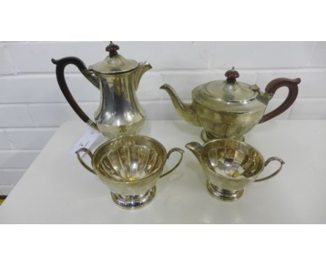 George V four piece silver tea and coffee set comprising teapot, coffee pot, cream jug and sugar bowl with makers mark for He