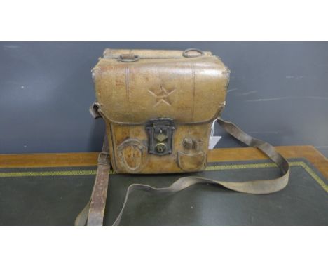 A vintage Chinese army brown leather document holder with brass clasp to front with apertures for pens etc. with embossed sta