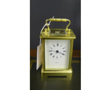 Angelus brass and glass panelled carriage clock of small proportions, 15 cm high 