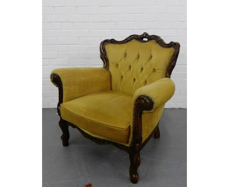 A mahogany framed armchair with upholstered button-back arms and seat,  90cm x 89cm