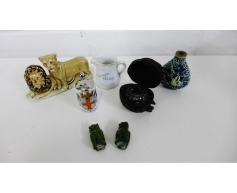 A mixed lot to include a carved nut inkwell, miniature porcelain stein and jug, scent bottle, two hardstone owls and a porcel