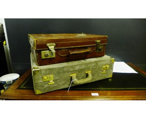 A grey suede and brass mounted suitcase together with a vintage brown leather case (2), largest 55cm x 45cm 