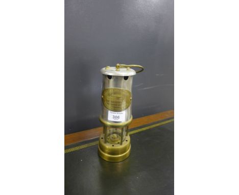 A miners safety lamp, 23cm high