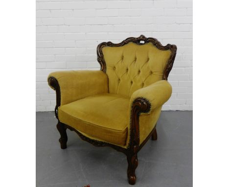 A mahogany framed armchair with upholstered button-back arms and seat,  90cm x 89cm