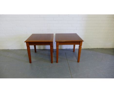 A pair of cherrywood lamp tables, the square tops on tapering supports (2) 