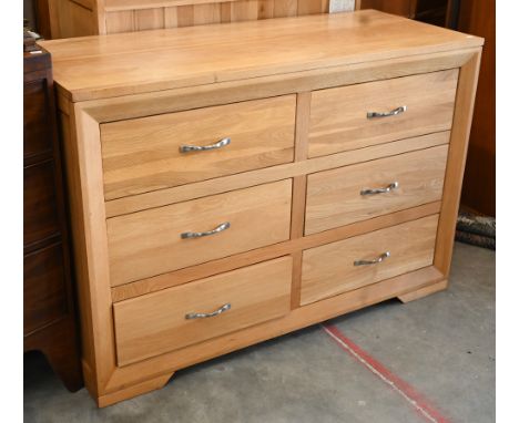 A contemporary light oak chest of six short drawers, 120 x 50 x 82 cm high (to match following lot) 