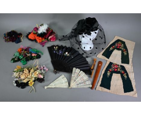 A collection of vintage dress/hat trimmings etc including felt flowers, silk flower corsages, a spotted net and 'flower' head