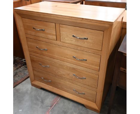 A contemporary light oak chest of two short over three long drawers, 90 cm wide x 45 cm deep x 94 cm high 