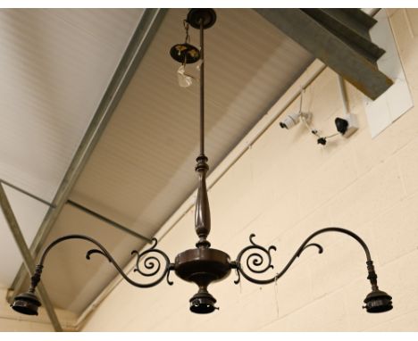 A bronzed twin-branch ceiling light with three fittings 