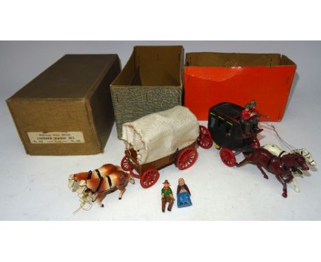 Taylor and Barrett set 302 Covered Wagon with Pioneer and Wife in original box (Condition Very Good, box Good) and Johillco S