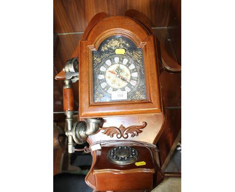 AN UNUSUAL WALL HANGING CLOCK TELEPHONE 