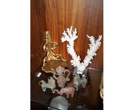 A PIECE OF CORAL MOUNTED ON A MARBLE BASE TOGETHER WITH A GILDED CORNER SHELF AND FOUR UNUSUAL ORIENTAL ITEMS (6)