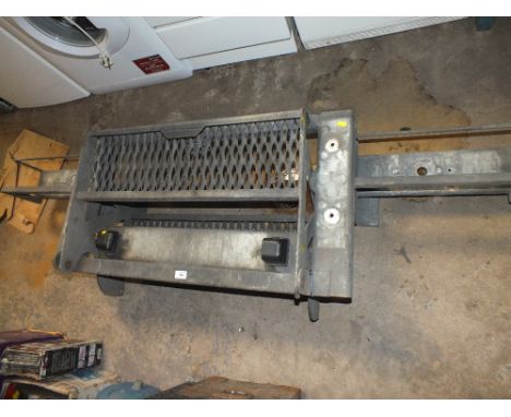 REAR LORRY ATTACHMENT WITH FOLDABLE STEP