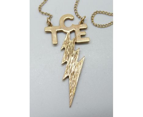 A 9ct gold Elvis Presley TCE logo necklace, 4.5cm pendant, 5.2g