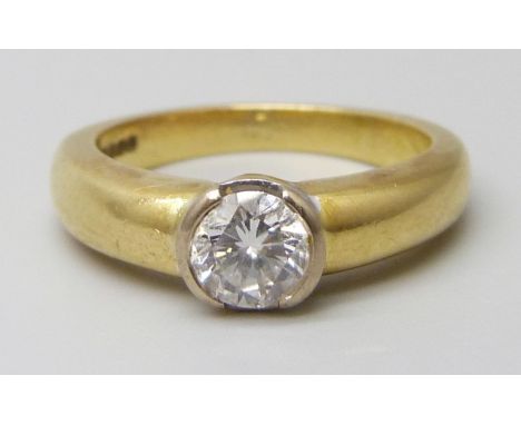 An 18ct gold diamond solitaire ring, 6.6g, J/K