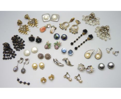 Twenty two pairs of vintage clip on and screw back earrings 