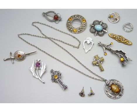 A collection of Scottish and Celtic brooches and pendants 
