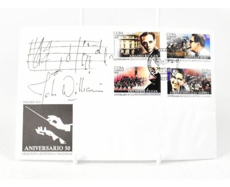 JOHN WILLIAMS; a first day cover signed by the composer beneath handwritten Star Wars music score.We have not authenticated t
