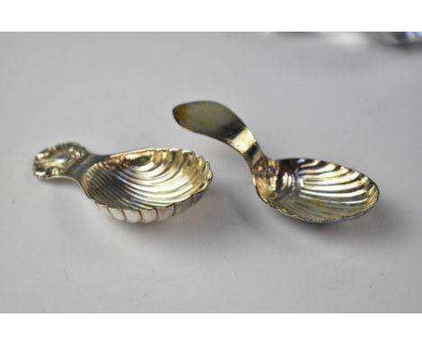 A hallmarked silver caddy spoon with shell bowl and finial, by Richards &amp; Knight, London 1973, approx 0.7ozt and a silver
