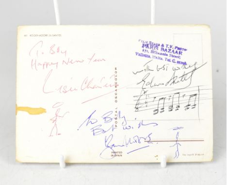 THE SAINT; a postcard bearing the signatures of three stars including Roger Moore.We have not authenticated these signatures,