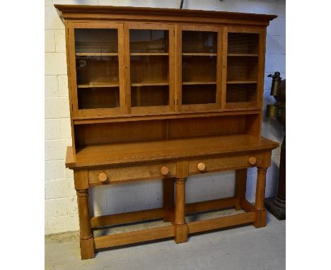 A modern bespoke made large and impressive kitchen dresser with two glazed display cabinets revealing two plate rack shelves 
