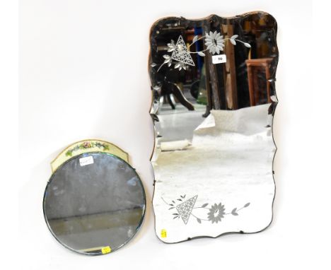 A mid-20th century rectangular wall mirror, with reverse cut floral decoration within a bevel scalloped edge, held with clips