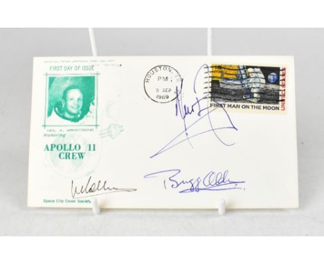 SPACE EXPLORATION; a first day cover dated 1969 bearing the signatures of Neil Armstrong, Buzz Aldrin and Michael Collins.We 