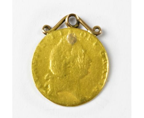A George III spade half guinea, with soldered 9ct gold necklace bracket, approx 4.1g, diameter of coin approx 2cm.