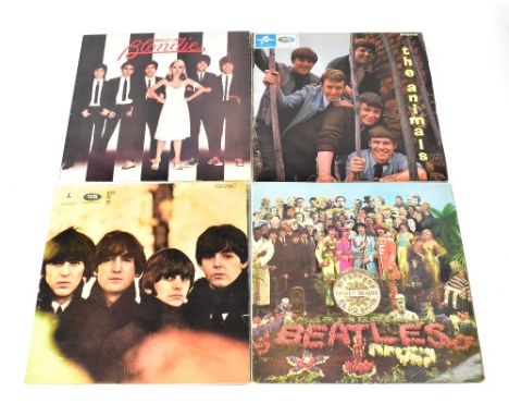 A collection of fourteen LPs to include The Beatles, 'White Album,', Sgt. Pepper' 'Help' etc, Cliff Richard, The Animals, The