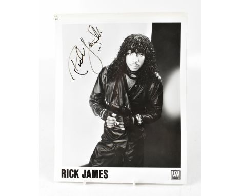 VARIOUS ARTISTS; five reproduced black and white photographs bearing signatures of Quincy Jones, Luther Vandross, Billy Ocean
