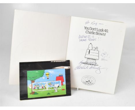 CHARLES SCHULZ; 'You Don't Look Forty Charlie Brown!', a single volume inscribed 'To Ray, Happiness is having friends', signe