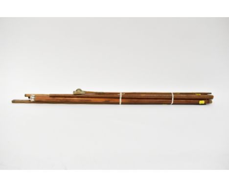 Seven walking sticks and swagger sticks of various plain form, to include one walking stick with white metal top, engraved wi