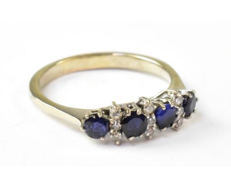 An 18ct white gold diamond and sapphire ring, the four claw set sapphires separated by three rows of two tiny diamonds, on a 