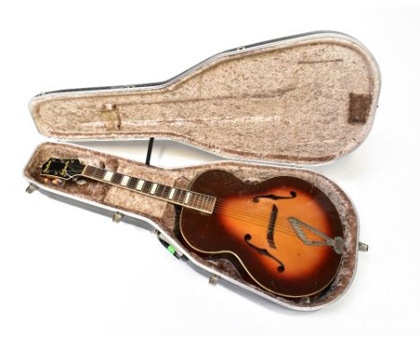 GRETSCH; an early 1950s 'Syncronatic' arch top guitar with violin cut-outs, length 106cm, in a Hiscox hard 'Light Flite' case