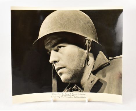 ROBERT WAGNER; a black and white photograph from 'The Longest Day', inscribed and bearing the actor's signature to the revers