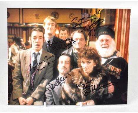 ONLY FOOLS AND HORSES; a reproduced colour photograph bearing five signatures of the stars, 20 x 25cm.We have not authenticat