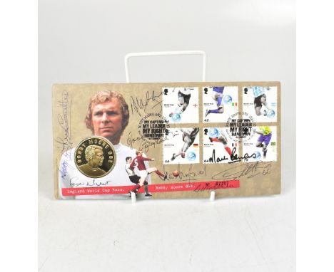 ENGLAND WORLD CUP WINNERS 1966; a first day cover/coin presentation pack bearing multiple signatures including Nobby Stiles a
