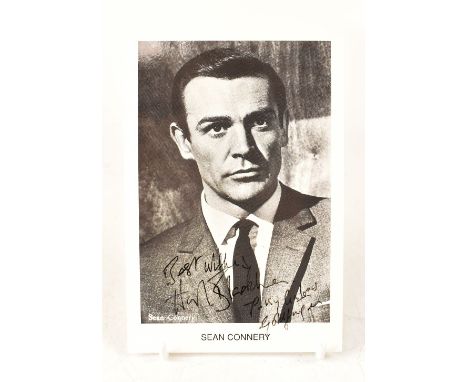 HONOR BLACKMAN; a James Bond promotional postcard depicting Sean Connery signed by the Pussy Galore actress.We have not authe