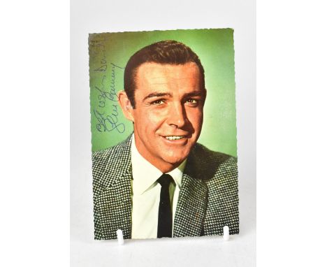 SEAN CONNERY; a coloured photographic postcard bearing the star's signature and inscribed 'Best Wishes David'.We have not aut