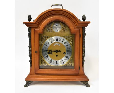 SCHMECKENBECHER; a reproduction mahogany cased chiming bracket clock with brass dial, dome top, ormolu acorn finials, gilt me
