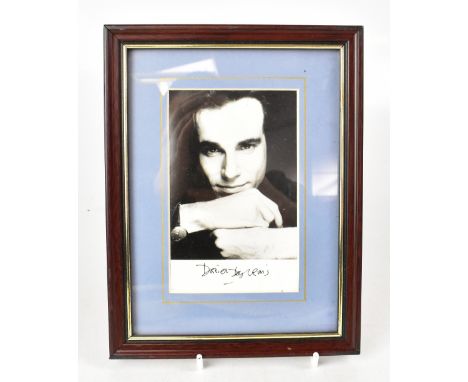 FILM & MUSIC; a group of six autographed stock photographs to include Daniel Day Lewis, Charlton Heston, Elizabeth Hurley, Al