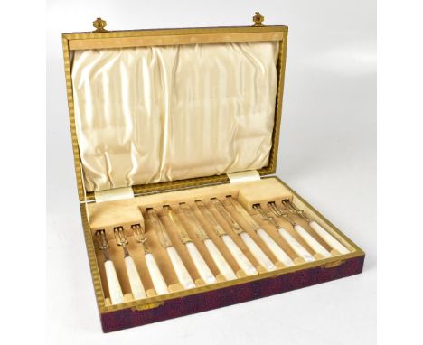 A George V hallmarked silver cased six setting set of dessert flatware with mother of pearl handles, Cooper Brothers &amp; So